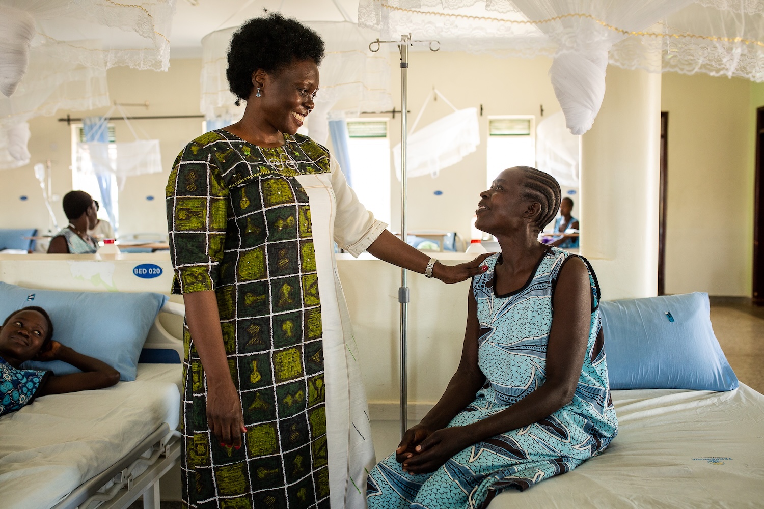 Alice Emasu with a woman supported through TERREWODE in Uganda