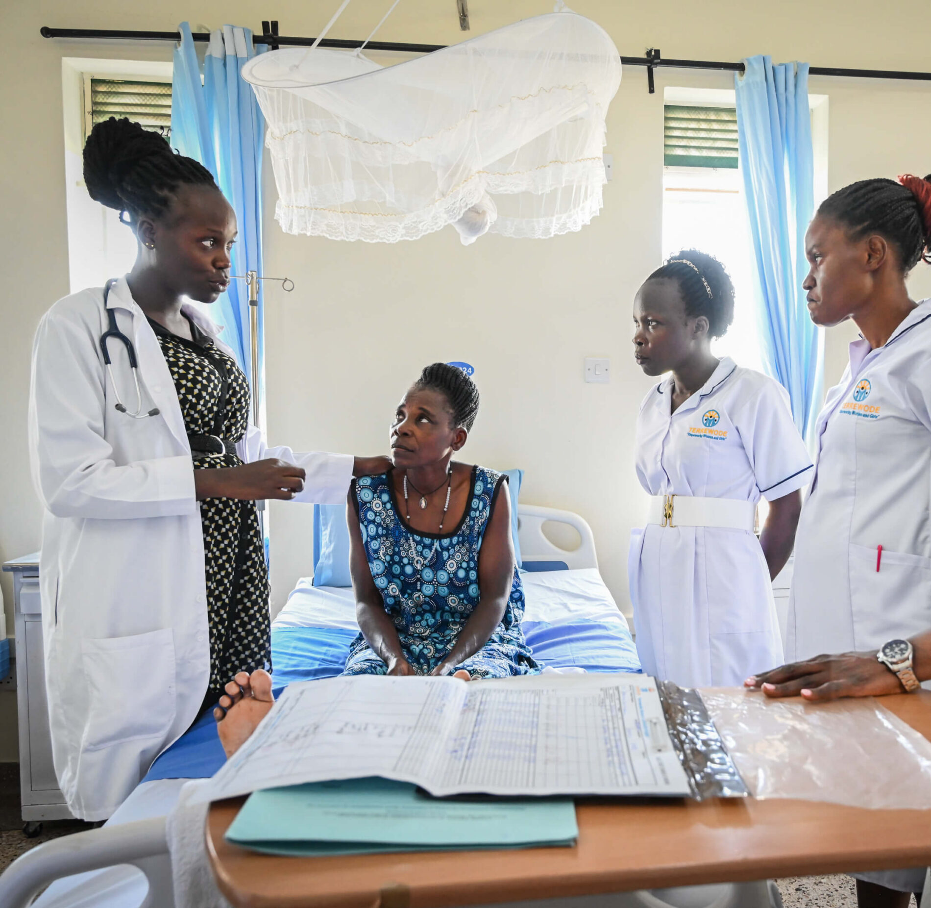 A medical team tend to a fistula patient