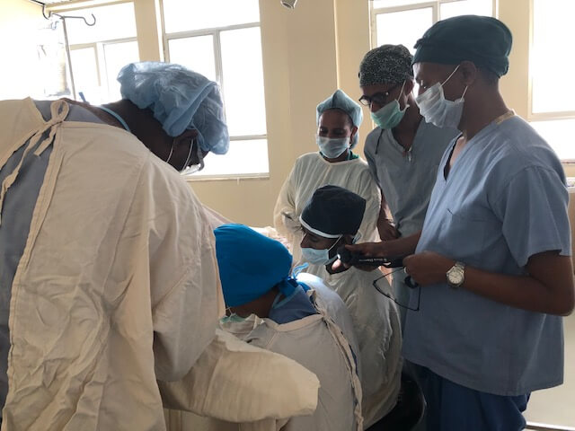 Medical team providing specialized fistula care during clinical training